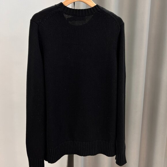 Polo Ralph Lauren Wearing sunglasses and a black sweater with a bear pattern - Picture 5 of 6